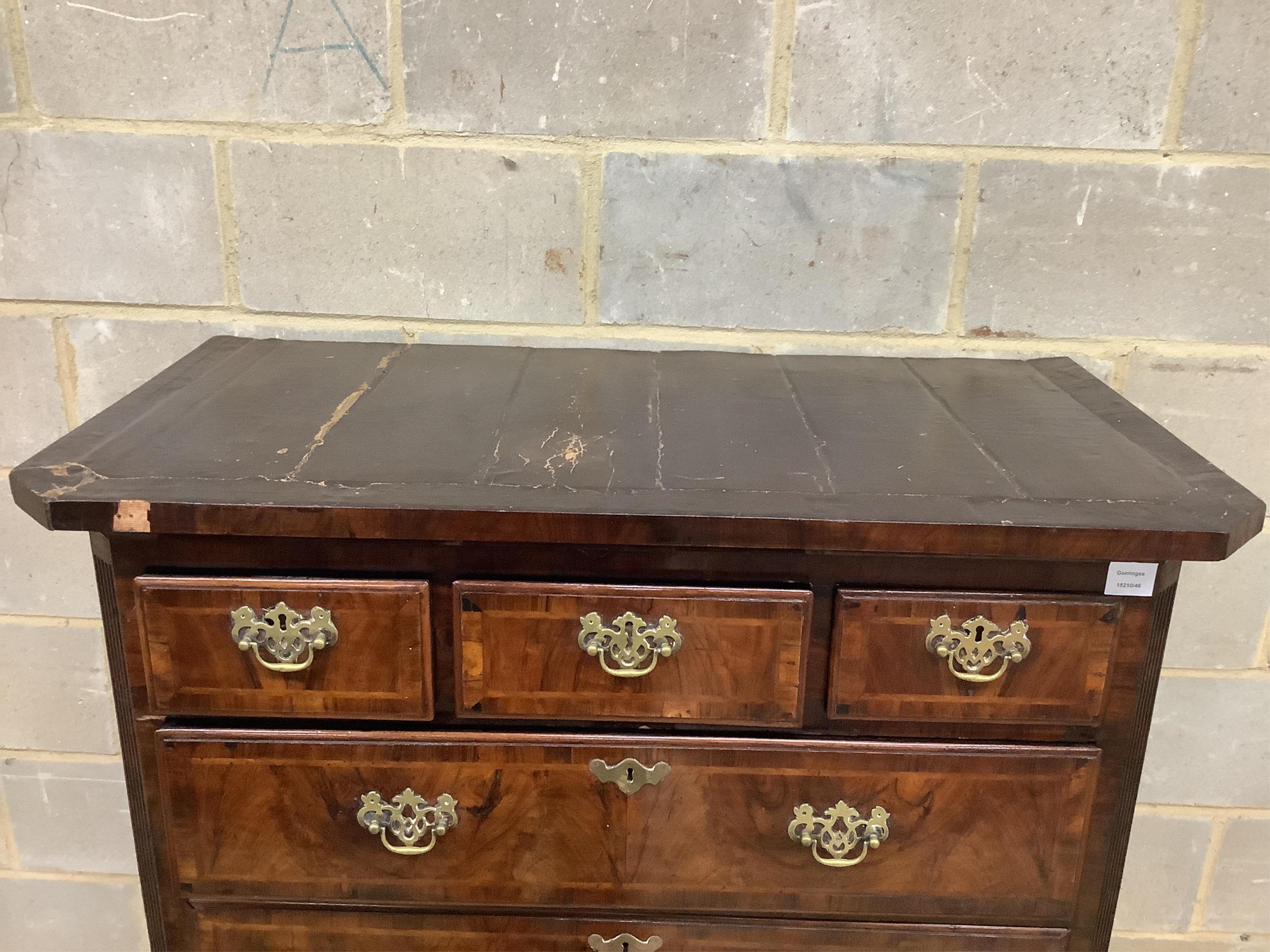 An 18th century walnut chest on later stand, width 106cm, depth 56cm, height 159cm. Condition - fair to good